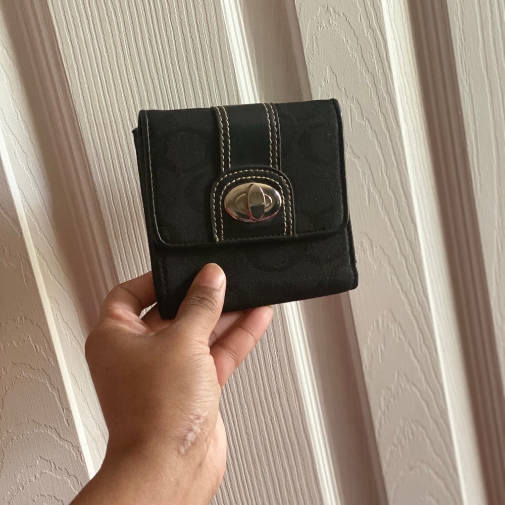 Authentic Coach turn lock buckle wallet